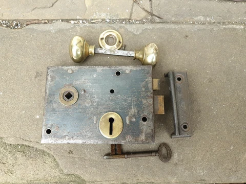 Old door rim lock, keep, & brass handles & brass backplate, & key working order Cover
