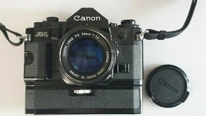 Canon A-1 1.4/50mm+Winder A - Foto 1 di 4