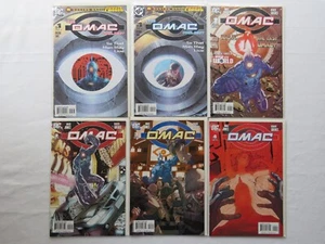 Lotto di 6 bustine e tabellone DC Comics 'OMAC' vintage 2005-06 # 1, 2, 3, 4 - Foto 1 di 7