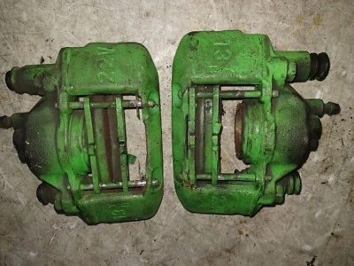 (2pc) 97-98 Mazda Protege Front Left & Right Brake Calipers Set w Bracket & Pads - Image 1 of 4