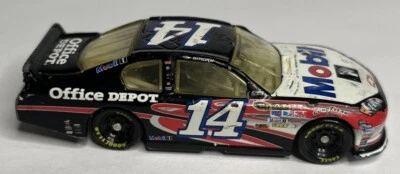 Tony Stewart 1/64 2012 #14 Mobil 1 Chevy Impala NASCAR Diecast Car Lionel ~ GI Foto 1 de 4