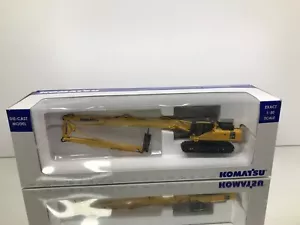 UNIVERSAL HOBBIES 8011U KOMATSU PC450LCD w LONG TONGS CRANE -1:50- GOOD IN BOX - Imagen 1 de 8