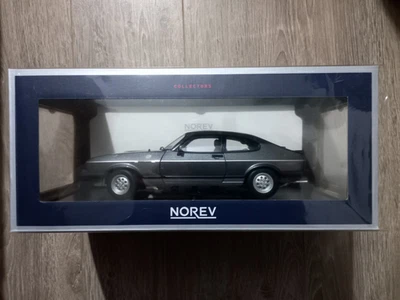 Редкий Norev 182725 1:18 Ford Capri Mk3 2.8i 1981 металлический серый и серебристый правосторонний новый  - Изображение 1 из 4