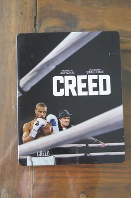 CREED DVD AND BLU-RAY IN STEELBOOK MICHAEL B. JORDAN SYLVESTER STALLONE ROCKY - Image 1 of 4
