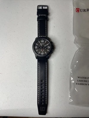 Relógio Curren masculino mostrador preto pulseira de couro marrom data M8314 com bateria - Imagem 1 de 4