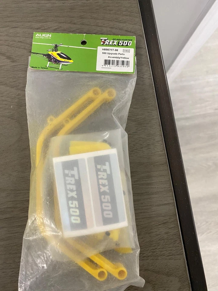 T-REX500 H50076T-06 UPGRADE PARTS ASSEMBLY YELLOW - Image 1 of 1