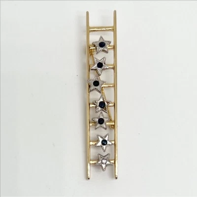Broche prendedor estrella escalera éxito Mary Kay vintage años 90 tono dorado piedras azules Foto 1 de 3