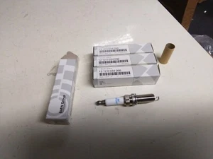 BMW SET OF FOUR NGK SPARK PLUGS 0034098. - Picture 1 of 9
