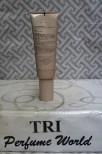 Crema hidratante tintada LAURA MERCIER 1,7 oz. (50 ml) FPS 30 Piel Natural # 0W1 PERLA - Imagen 1 de 2