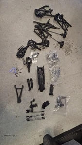 lotto ricambi traxxas e revo 2.0 vxl bracci paratie link piastre pattini - Foto 1 di 5