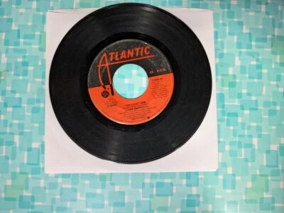 Laura Branigan, five Atlantic 45s, Solitaire, Lucky One, Ti Amo, Shattered Glass - Image 1 of 4