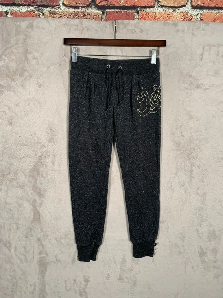 Pantalones deportivos Juicy Couture para niñas talla 8 grises con tachuelas Foto 1 de 4