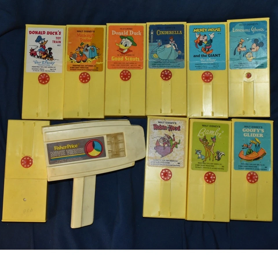 Juguete visor de películas Fisher-Price de colección con 10 cartuchos cintas años 70 PROBADO Foto 1 de 4