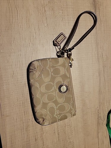 Bracciale Coach oro metallizzato carino! Portafoglio