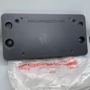 Soporte de matrícula delantero Porsche 971 807 287 A C FFF negro nuevo de fábrica OEM - Imagen 1 de 4