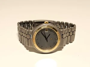 VINTAGE SCHWEIZER TITAN UND GOLD WERBUNG FÜR AUTO "FERRARI" QUARZ DAMEN UHR - Bild 1 von 15