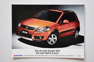 Foto de prensa de coche - Suzuki SX4 2005 - naranja - vista delantera/lateral - Imagen 1 de 1