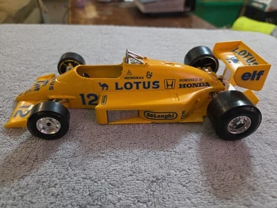 Burago  Lotus Honda Turbo  #12 Yellow F1 Diecast 1/24  - Image 1 of 4