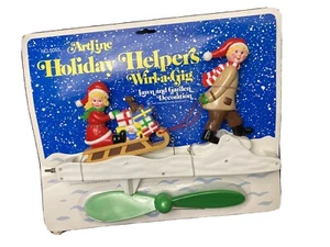 Vintage ArtLine Holiday Helper Whirl-A-Gig Boy &Girl Sled (Whirly Gig) Christmas - Picture 1 of 6