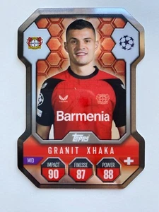 TOPPS MATCH ATTAX 24/25 GRANITO XHAKA BAYER LEVERKUSEN ESCUDO ELITE cromado - Imagen 1 de 2
