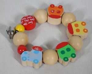 BABY'S COLORFUL WOODEN HANDHELD TRAIN THEME PIECES TEETHING RING / TOY 4" DIAM - Picture 1 of 3