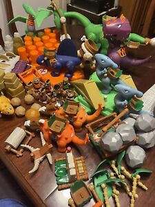 Huge Lot of 9 Little Tikes BC Builders Dinosaurs And 8 Caveman W Extras