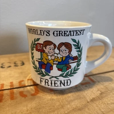 Taza de café vintage de dibujos animados de la década de 1970 "World's Greatest Friend" marca Papel   Foto 1 de 4