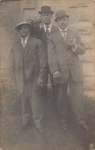 RPPC Tough Gentlemen 1910s Postcard Suit Smoking Cigar Top Hat Smirk Jacket Tie - Picture 1 of 2