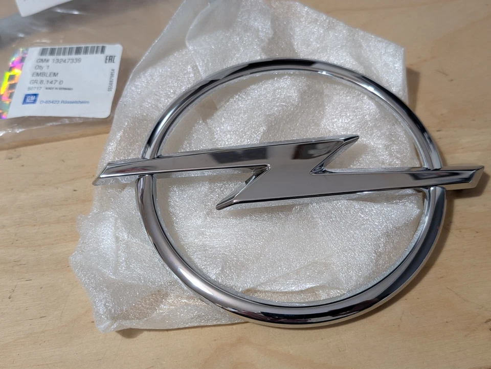 Nuevo emblema insignia parrilla radiador original Opel Zafira B 13247339 - Imagen 1 de 1