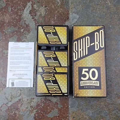SKIP-BO 50th Anniversary Edition Card Game Mattel Collectible Gold Black - Image 1 of 4
