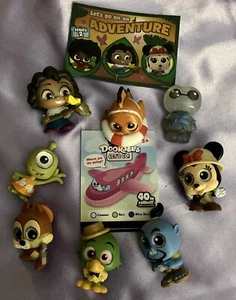 Disney Doorables Lets Go 2 Lot Of 8 NEVER USED! Nemo Chip Mirabel Genie Jose - Picture 1 of 2