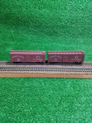 (2) Upgraded Athearn HO Northern Pacific 40' Slide Door Steel Boxcar NP 15827 - Image 1 of 4