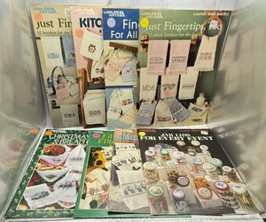 VTG Lot of 8 Leisure Arts Cross Stitch Patters Towels Jar Lids Mixed Themes - Picture 1 of 3