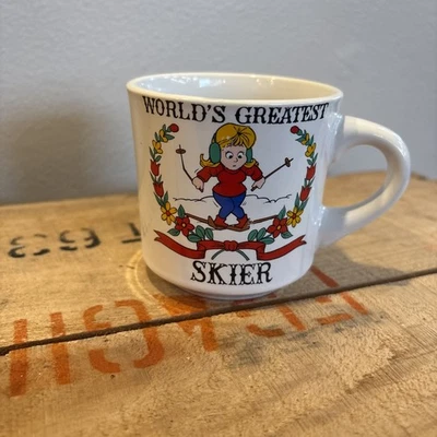 Taza de café vintage de dibujos animados "World's Greatest Skier" de la década de 1970 marca Papel   Foto 1 de 4