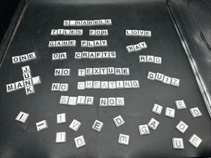 100 PLASTIC SCRABBLE TILES WHITE BLACK LETTERS NUMBERS FOR CRAFTS ALPHABETS PLAY - Picture 1 of 3