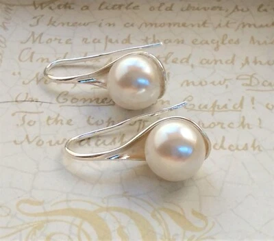 Pendientes de perlas crema austriacas. Cuchara de plata hecha a mano  Foto 1 de 4