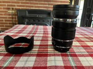 Olympus M.Zuiko Digital 12-100mm F4 IS PRO w/ hood and polarizing filter