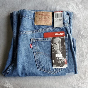 Vintage Y2K Deadstock NWT Levis 550 Denim Jeans 36x34 Mid Wash El Salvador - Picture 1 of 5