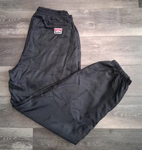 Pantalones cortavientos vintage Marlboro Unlimited de nailon forrados de lana negros talla XL - Imagen 1 de 16