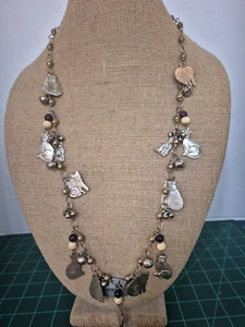De colección. Laurel Burch? Collar con dije con cuentas y cadena de anillo largo tono plata  - Imagen 1 de 10