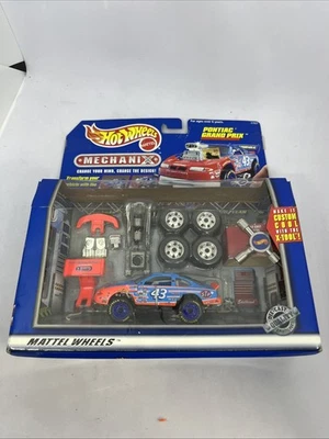 Vtg 1997 Hot Wheels MECHANIX Pontiac Grand Die-Cast X-Tool Transformer #43 STP - Image 1 of 4