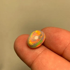 Natural Loose 6.20 Ct Splendid Fires Ethiopian White Opal - Picture 1 of 6