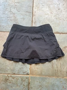 Ivivva by Lululemon Girls Set The Pace Skirt Size 10 Black Pleated Tennis Skort - Picture 1 of 4