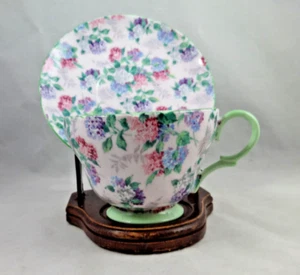 VINTAGE SHELLEY BONE CHINA HYDRANGEA CHINTZ PINK BACKGROUND TEA CUP & SAUCER SET - Picture 1 of 12