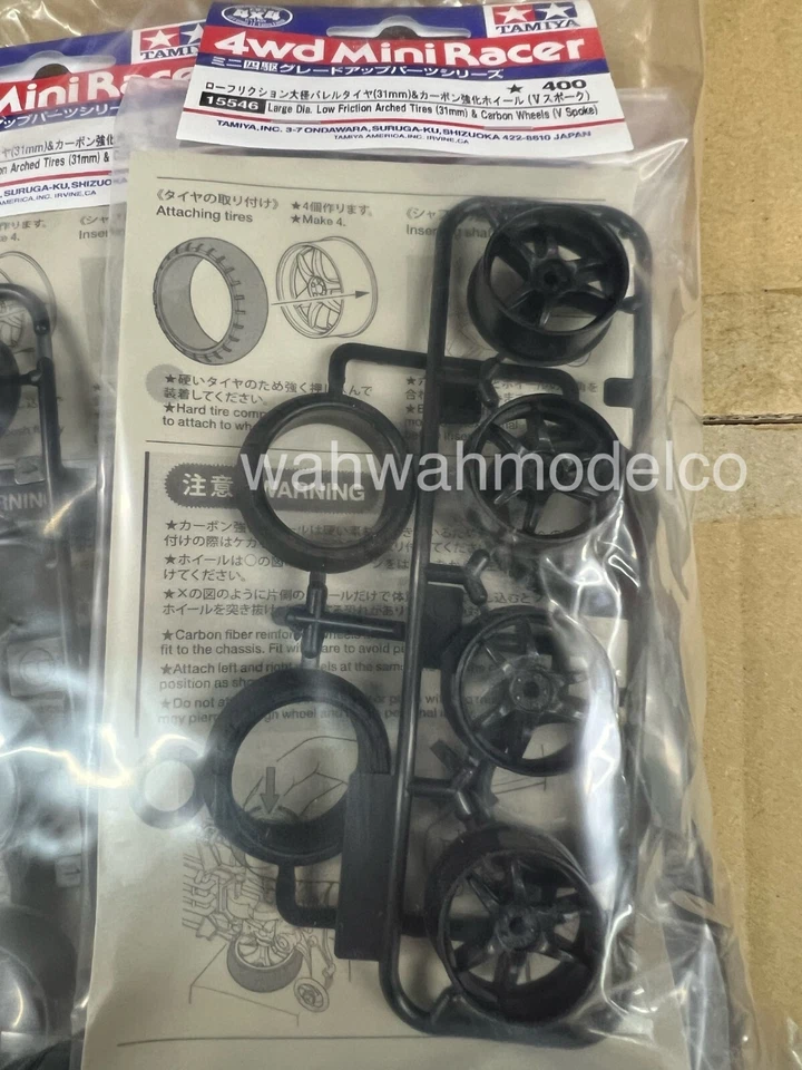 TAMIYA 15546 CARBON V RIMS + LARGE DIAM TIRES 31mm - Image 1 of 1