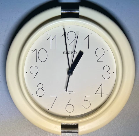 VIntage Seiko 8” Off-White Quartz Wall Clock Plastic/Glass Japan ICEG Metal Bars Cover