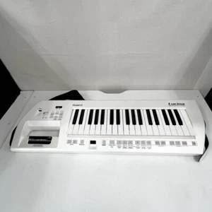 Roland Lucina AX-09 Tastatur Synthesizer Keytar gut funktionierend kostenloser Versand - Bild 1 von 6