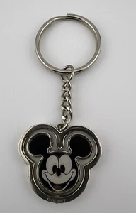 Walt Disney World Mickey Symbol Spinner Metall Schlüsselanhänger linsenförmig - Bild 1 von 6