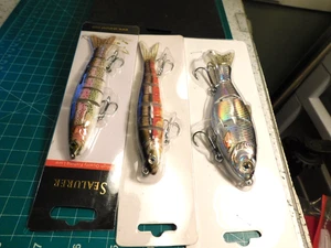 Señuelos de pesca de 5 1/4" de plástico con ojos de vidrio de 3 articulaciones 1 sellador 2 sin marca - Imagen 1 de 17