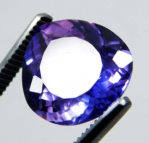 Piedra preciosa suelta de tanzanita púrpura natural extremadamente rara corte pera AAA+ 16,50 quilates - Imagen 1 de 8